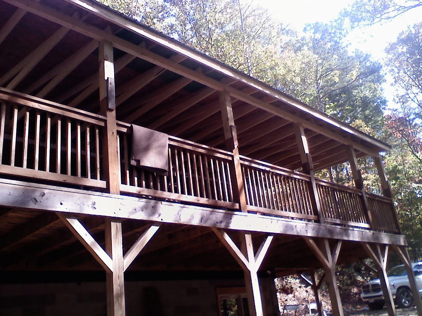 Timber framing under a new elevated porch and deck — Roof Leak Repair in Old Forge by Roofing Brothers